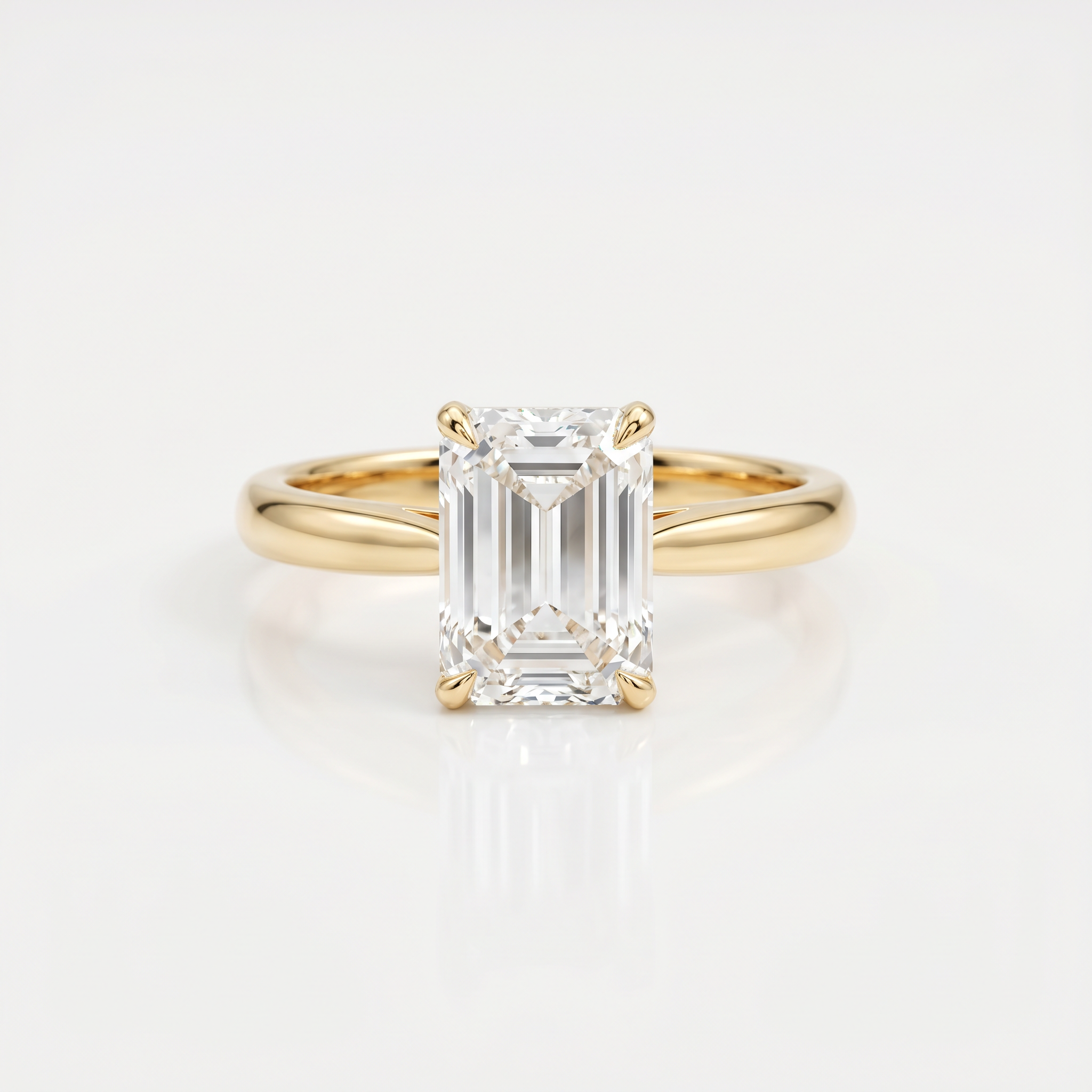 Verlobungsring Emerald in 18k Gelbgold mit Smaragdschliff-Diamant