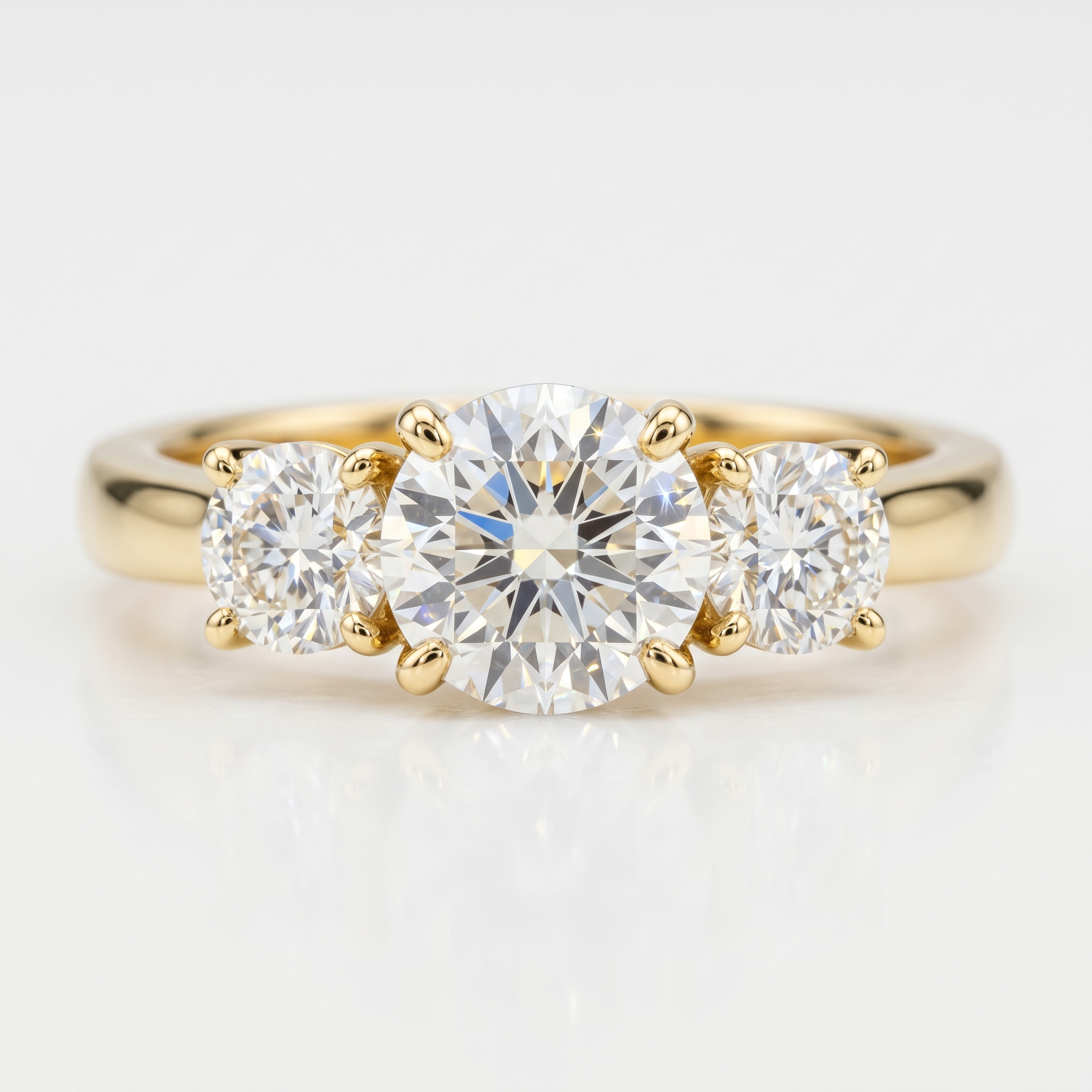 Trilogy-Ring Tria in 18k Gelbgold mit drei Diamanten