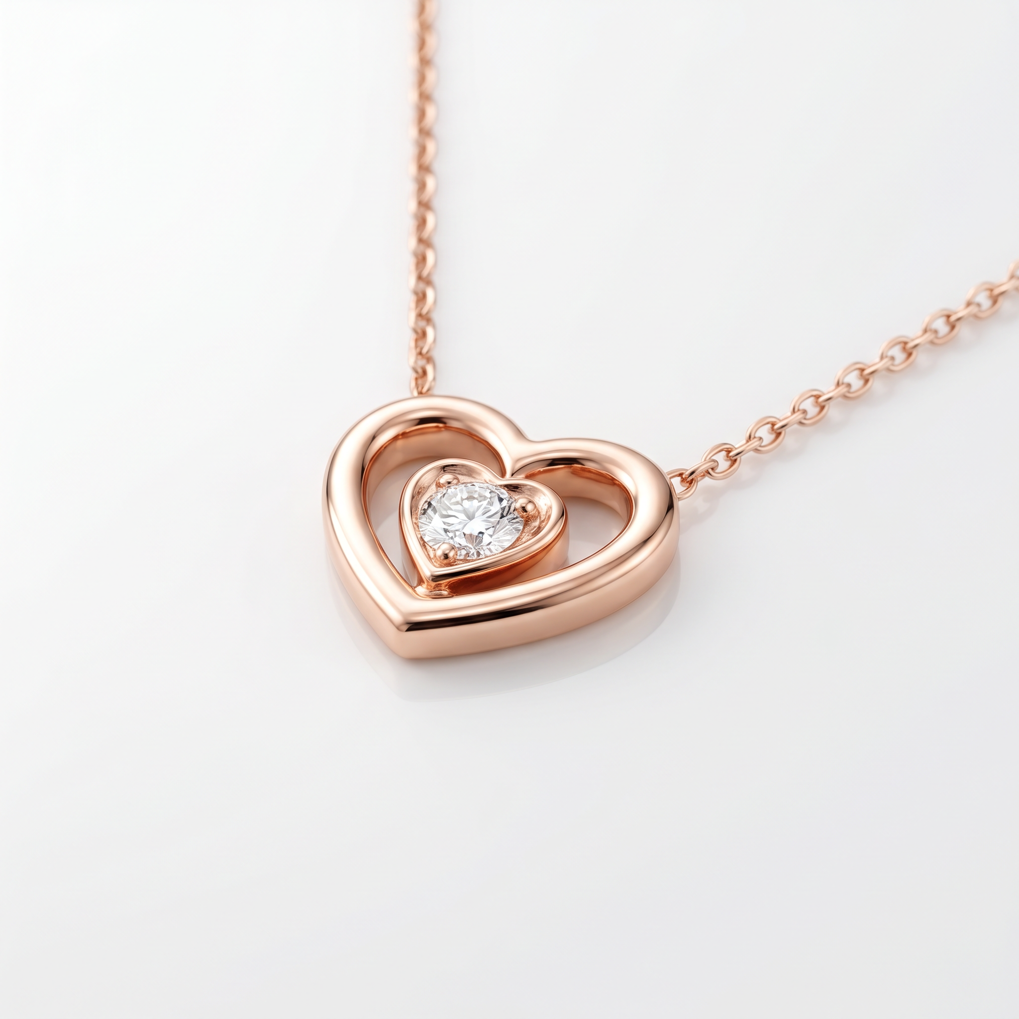 Herz-Anhänger Amore in 18k Roségold mit Diamant